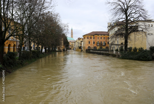 swollen river called RETRONE in the city of Vicenza in Northern Italy during the flood photo