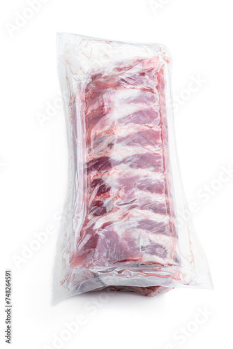 Fresh raw pork ribs in a vacuum package isolated on white © lena_zajchikova
