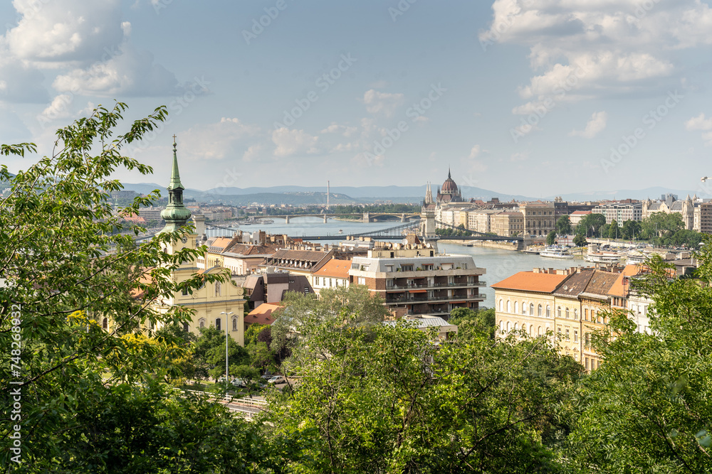 Historical buildings in Budapest, Danube river famous bridges and city views. Hungary.