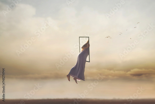 surreal and magical journey of a woman who disappears from the real world through a frame, merging into the sky, abstract concept photo