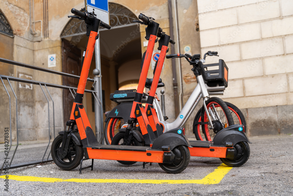 electric scooter and electric bicycle rental subscription service in urban parking in city