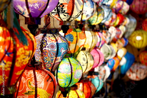 Brightly coloured lanterns filled with light