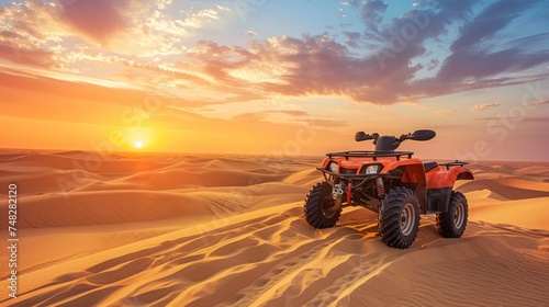 Off-road safari in the Empty Quarter Desert of the United Arab Emirates, featuring a quad bike navigating sand dunes during sunset photo