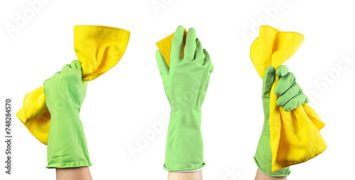 Hand in gloves holding yellow polishing microfiber wiper, clothes set, isolated on white