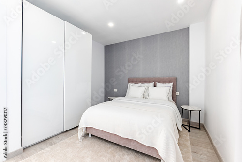 a double bed in a guest bedroom of a mediterranean holiday home 