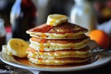 A stack of tasty pancakes on a plate.