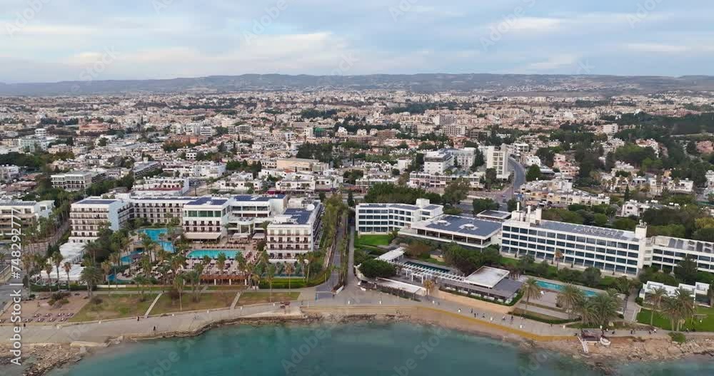 Aerial view of the cityscape of Paphos, Cyprus. Beautiful coastline with hotels on an island in the Mediterranean Sea. High quality 4k footage Aerial view of the cityscape of Paphos, Cyprus. Beautiful coastline with hotels on an island in the Mediterranean Sea. High quality 4k footage