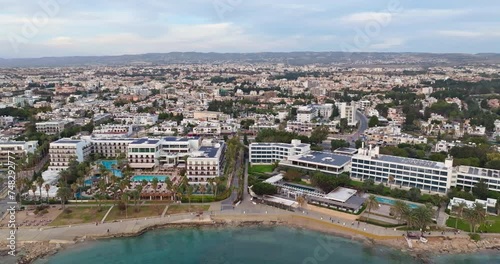 Aerial view of the cityscape of Paphos, Cyprus. Beautiful coastline with hotels on an island in the Mediterranean Sea. High quality 4k footage photo