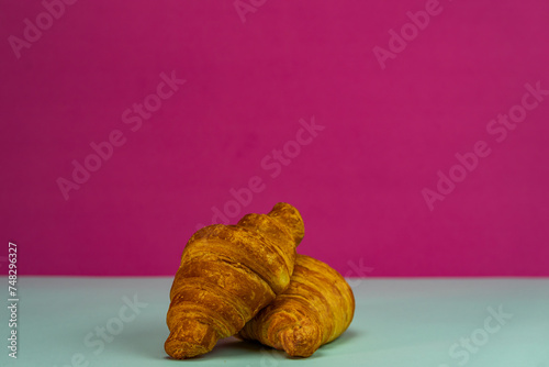 Fresh and delicious croissants isolated. French breakfast concept.