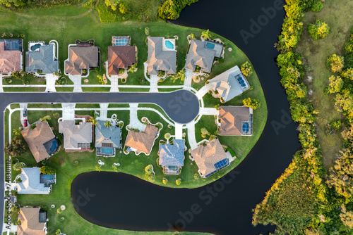 Residential homes in suburban sprawl development in North Port, Florida. Low-density private houses in rural suburbs. Housing market in the USA photo