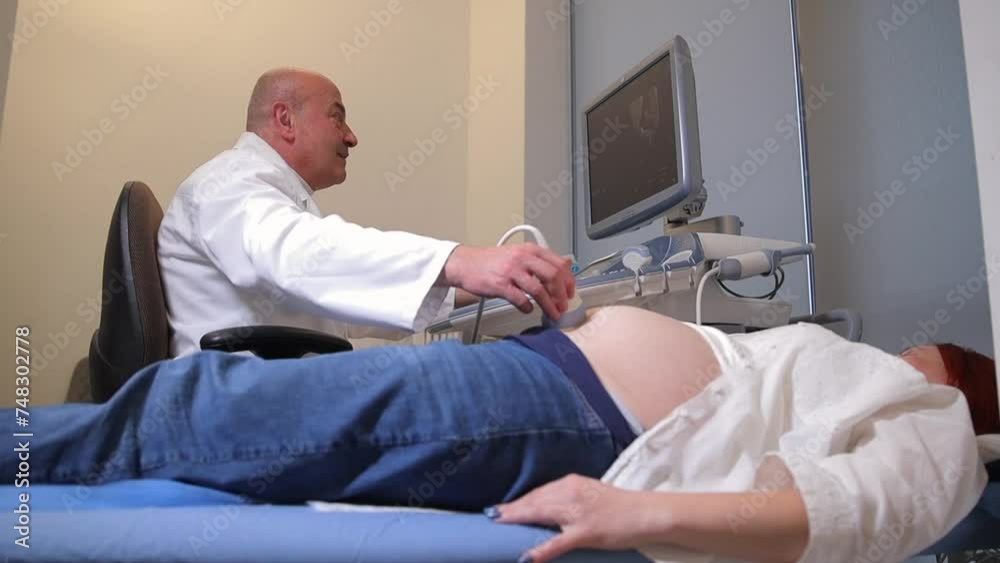 Young attractive pregnant woman on reception at the doctor, health check. Young attractive pregnant woman on reception at the doctor, health check.
