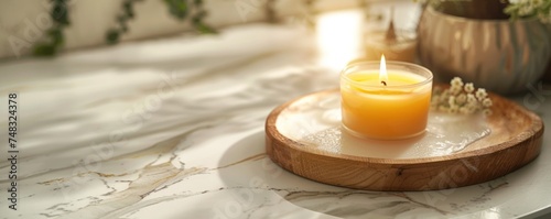 wax spa and candle on white marble background
