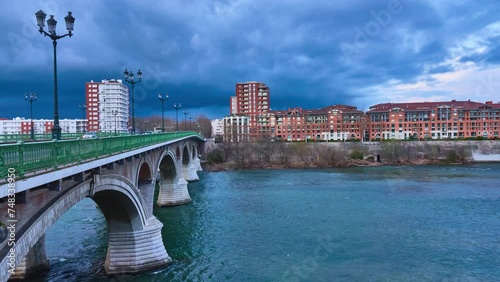 Pont des Catalans (Amidonniers bridge) is a Toulouse bridge crossing the Garonne, France. It is a bridge in arch and stone and reinforced concrete inaugurated in 1908, architect Paul Sejourne. photo