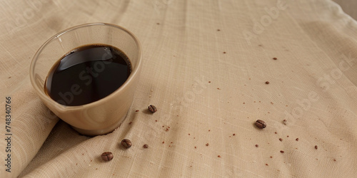 Beige mug of black coffee, with a foam pattern, on beige linen fabric , pieces of coffee, coffee beans, fragrant coffee at home. Generative AI.