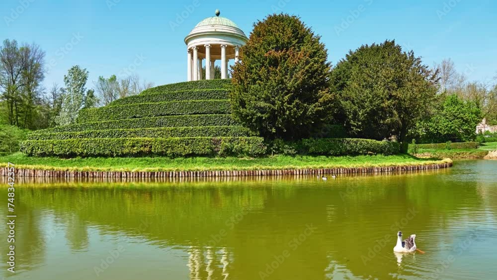 Parco Querini is green area of city of Vicenza, Italy. Monopteros is circular colonnade supporting roof but without any walls. Unlike tholos, it does not have walls making cella or room inside. Parco Querini is green area of city of Vicenza, Italy. Monopteros is circular colonnade supporting roof but without any walls. Unlike tholos, it does not have walls making cella or room inside.