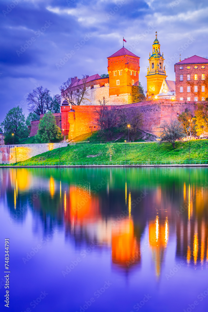Krakow, Poland. Wawel Castle and Vistula River water reflection, historical Cracovia.