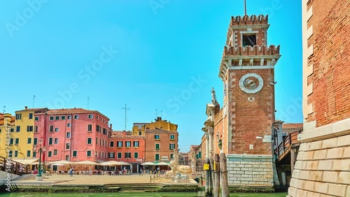 VENICE, ITALY - APRIL 26, 2018: Venetian Arsenal is complex of former shipyards and armories clustered together. Owned by state, Arsenal was responsible for bulk of the Venetian republic's. photo