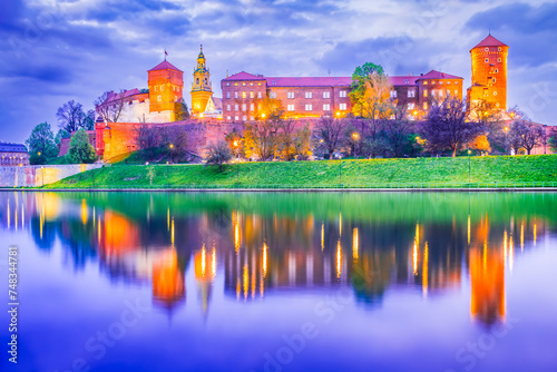 Krakow, Poland. Wawel Castle and Vistula River water reflection, historical Cracovia. photo