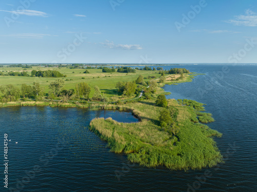 Aerial view at Zalew Szczeciński. Shore od Dąbie Lake, Lubczyna, Poland.