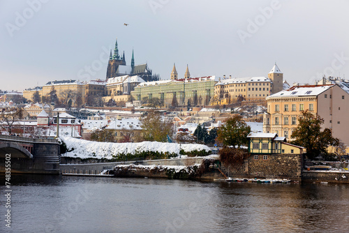 Obraz na płótnie Snowy Prague City with gothic Castle in the sunny Day, Czech Republic w salonie