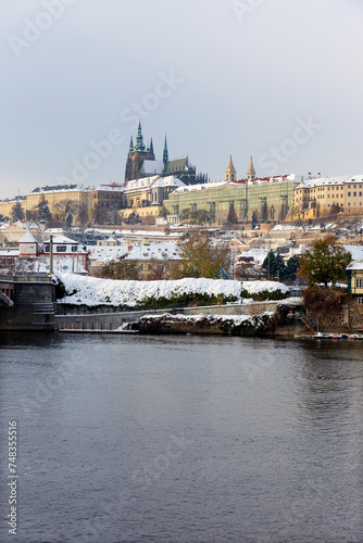 Obraz na płótnie Snowy Prague City with gothic Castle in the sunny Day, Czech Republic w salonie