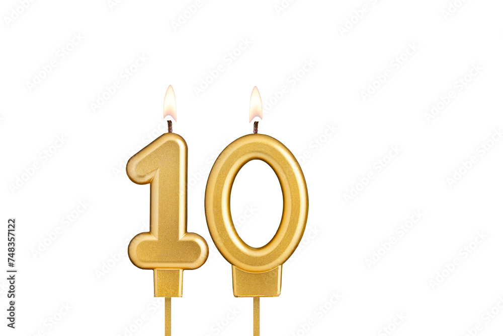 Golden number 10 birthday candle on white background Golden number 10 birthday candle on white background