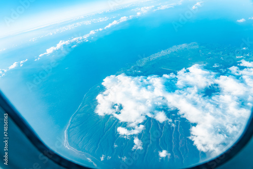 Aerial photography of Honolulu to Hilo from the plane. Lanai is the sixth-largest of the Hawaiian Islands and the smallest publicly accessible inhabited island in the chain.

