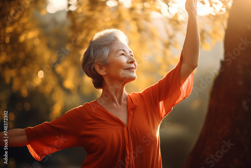 Elderly Woman Enjoying Outdoor Stretch in Sunlight