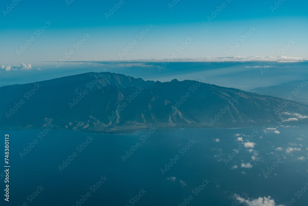 The West Maui Mountains, West Maui Volcano, or Mauna Kahālāwai which means The West Maui Mountains, West Maui Volcano, or Mauna Kahālāwai which means