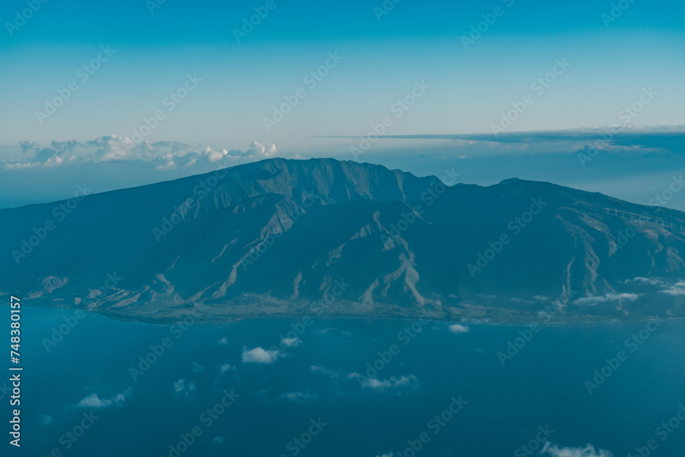 The West Maui Mountains, West Maui Volcano, or Mauna Kahālāwai which means The West Maui Mountains, West Maui Volcano, or Mauna Kahālāwai which means