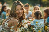 Radiant Young Woman Smiling in Sunlit Field with Wildflowers - Outdoor Portrait in Natural Setting