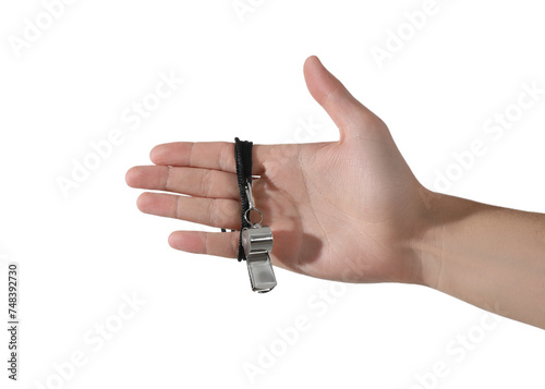 Referee holding whistle on white background, closeup
