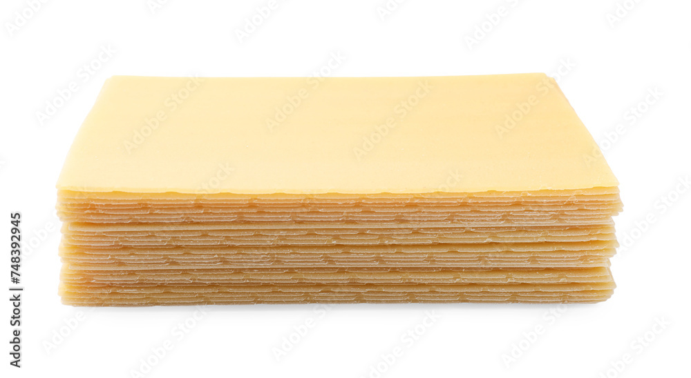 Stack of uncooked lasagna sheets isolated on white