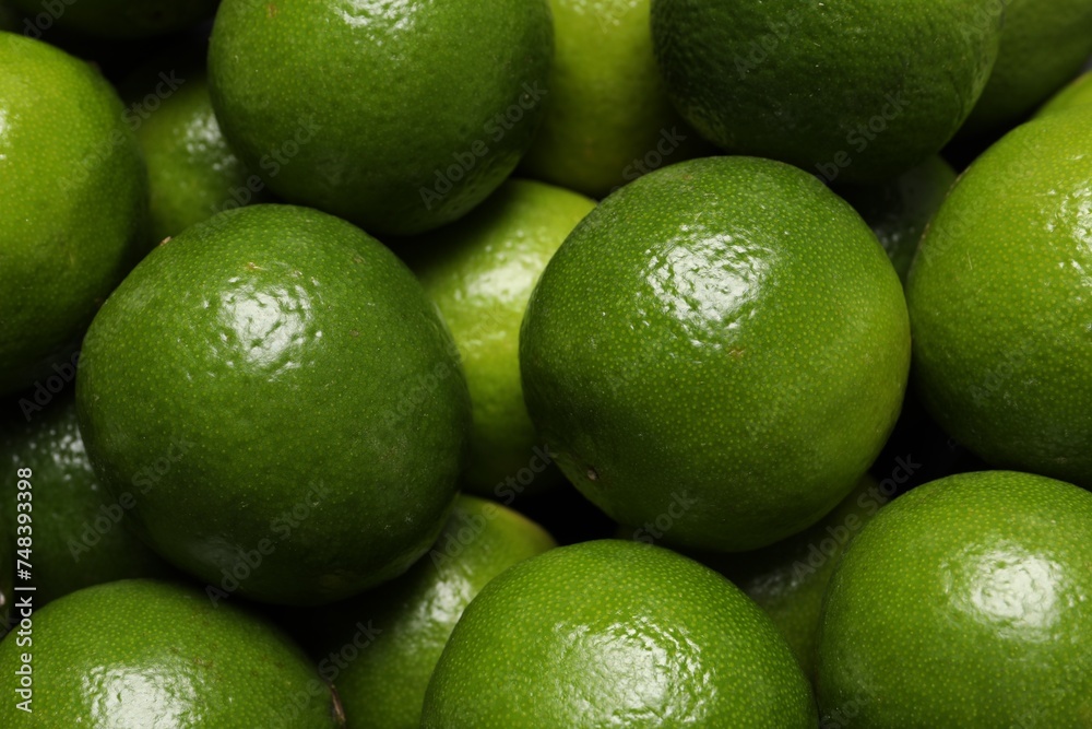 Many fresh ripe limes as background, closeup Many fresh ripe limes as background, closeup