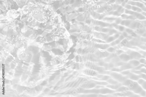 White water surface texture with ripples, splashes, and bubbles. Abstract summer banner background Water waves in sunlight with copy space cosmetic moisturizer micellar toner emulsion. White water.