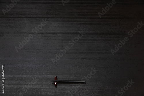 箸のある黒い座卓の背景、和風のテーブル