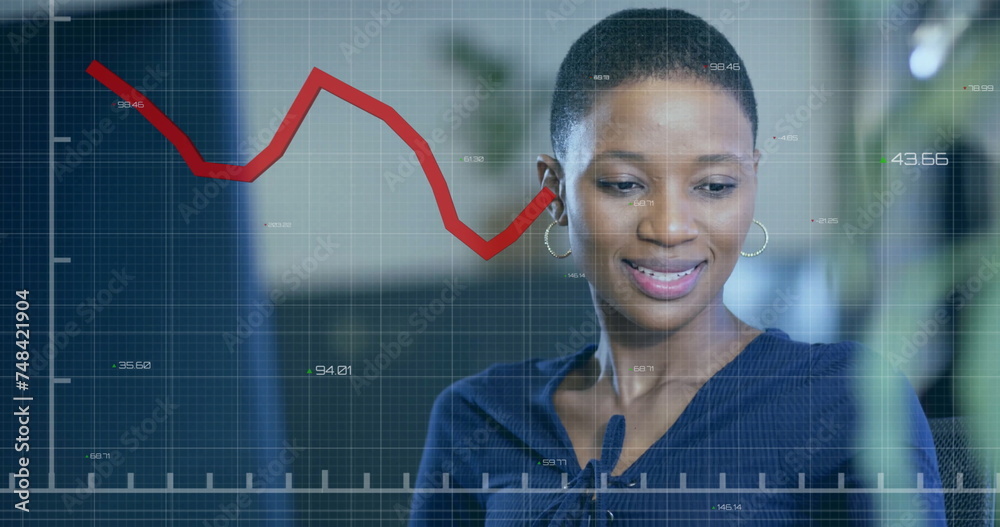 Image of financial data processing over african american businesswoman working in office Image of financial data processing over african american businesswoman working in office