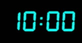 Image of blue digital clock timer changing on black background