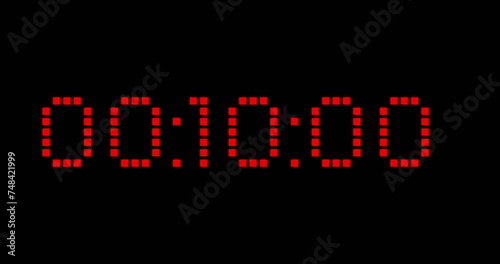 Image of red digital timer changing on black background