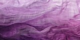 Abstract light purple weave of cotton or linen satin fabric lies texture background.