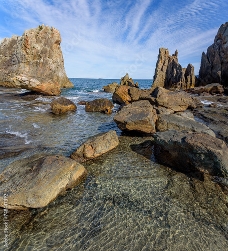 Hashigui Rocks amazing stone formations in Kushimoto Town in Kii Peninsula of Wakayama Prefecture in Japan photo