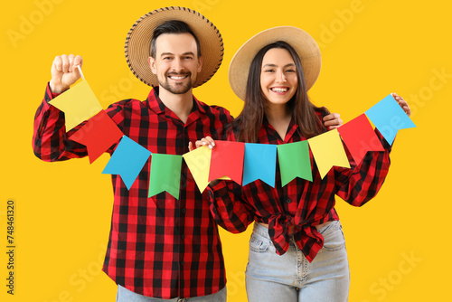 Young couple with flags on ...