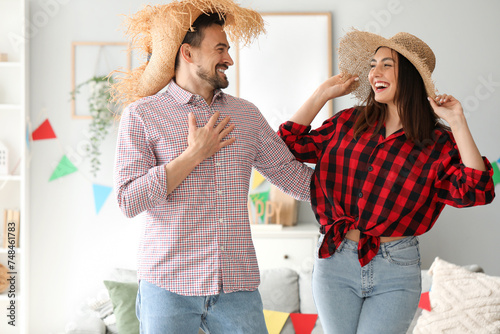 Young couple celebrating Fe...