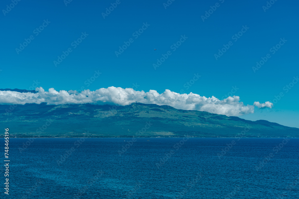 Papawai Scenic Lookout.  Honoapiilani Highway, Wesrt Maui, Hawaii. Haleakalā , or the East Maui Volcano, is a massive, active shield volcano that forms more than 75% of the Hawaiian Island of Maui. 
