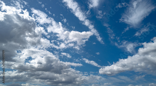 Summer blue sky cloud gradient background. Cloudy sky. Vivid cyan blue landscape in environment day horizon skyline view. White clouds on soft sky background. White cloudy sky.