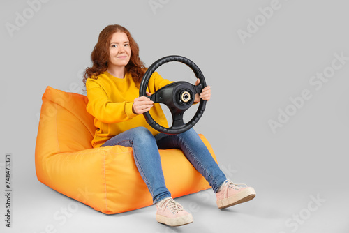 Pretty young woman with ste...