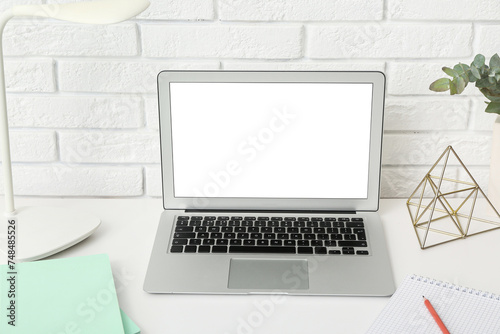 Modern laptop with blank wh...