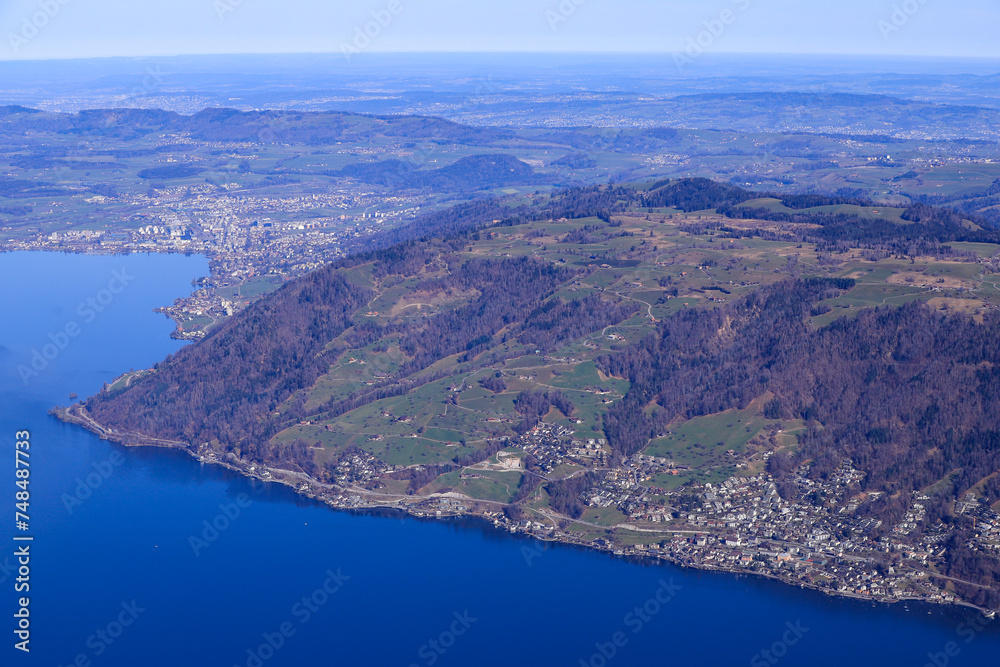 aerial view of central switzerland with its lakes, villages, mountains and forests