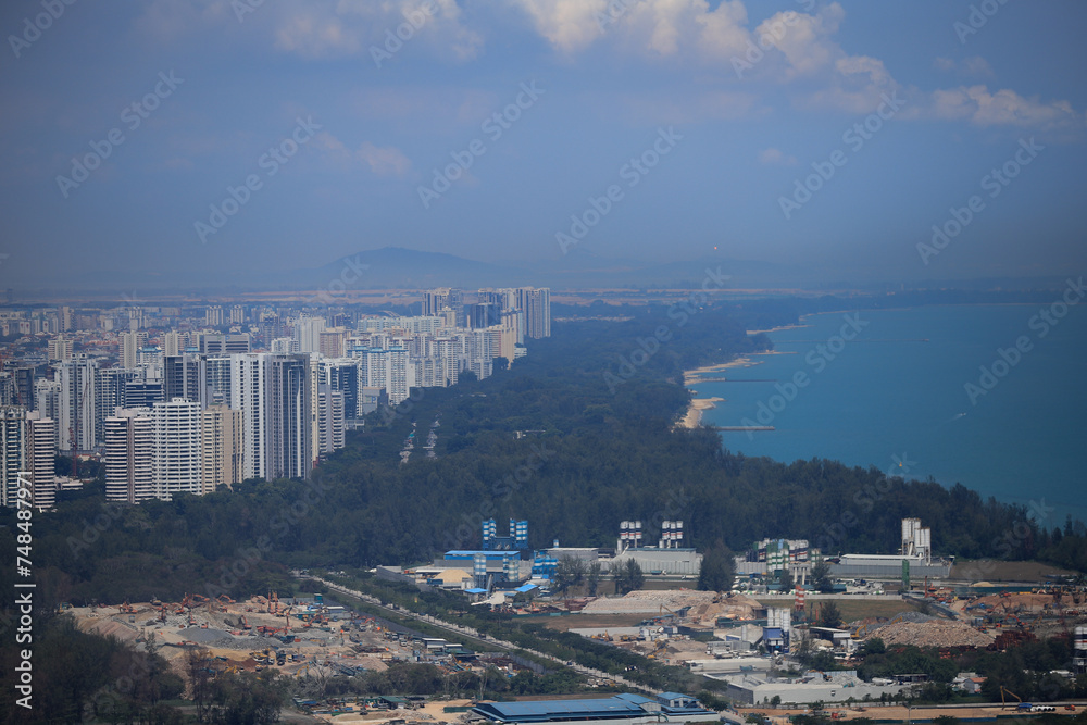 aerial view of Singapore's coastline with skyscrapers