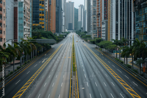 The empty highway surrounded by highrises photo